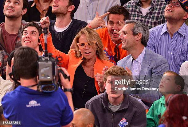 Katie Couric and John Molner attend the New York Knicks vs Indiana Pacers NBA playoff game at Madison Square Garden on May 5, 2013 in New York City.