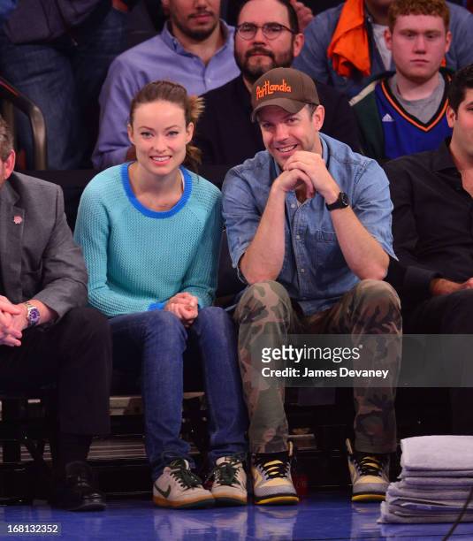 Olivia Wilde and Jason Sudeikis attend the New York Knicks vs Indiana Pacers NBA playoff game at Madison Square Garden on May 5, 2013 in New York...