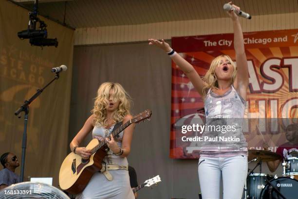 American sibling pop musicians and actresses Alyson and Amanda Michalka, who perform as Aly and AJ , play on the Petrillo Band Shell in Grant Park...