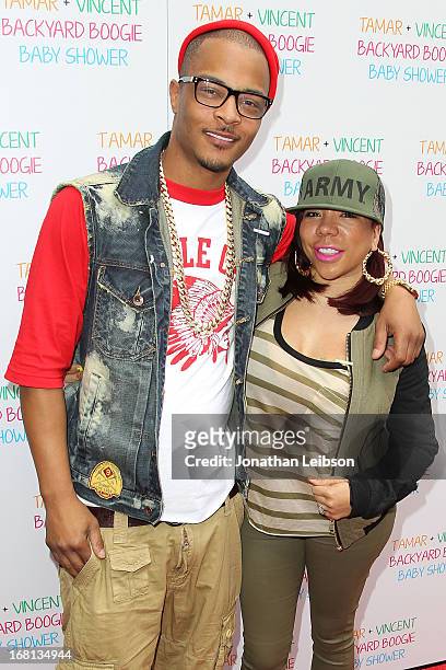 And Tameka Cottle attend as Tamar Braxton hosts a carnival-themed baby shower with friends and family at Hotel Bel-Air on May 5, 2013 in Los Angeles,...