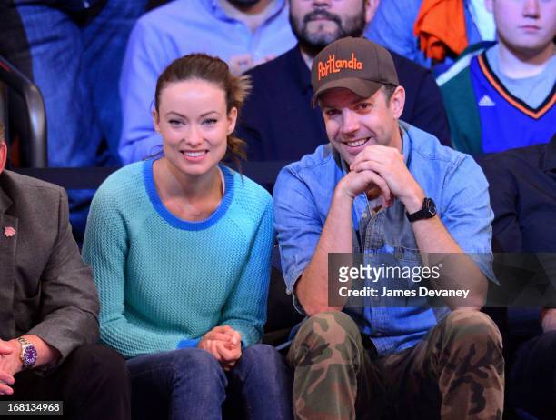Olivia Wilde and Jason Sudeikis attend the New York Knicks vs Indiana Pacers NBA playoff game at Madison Square Garden on May 5, 2013 in New York...