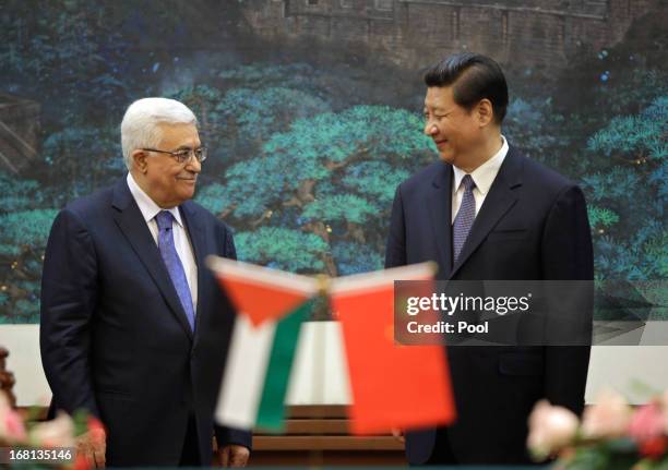 Palestinian President Mahmoud Abbas and China's President Xi Jinping attend a signing ceremony at the Great Hall of the People on May 6, 2013 in...