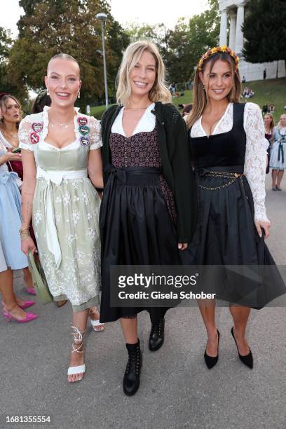 Cheyenne Ochsenknecht, Sarah Brandner, Laura Wontorra during the Madlwiesn" at the 188th Oktoberfest on September 21, 2023 in Munich, Germany.