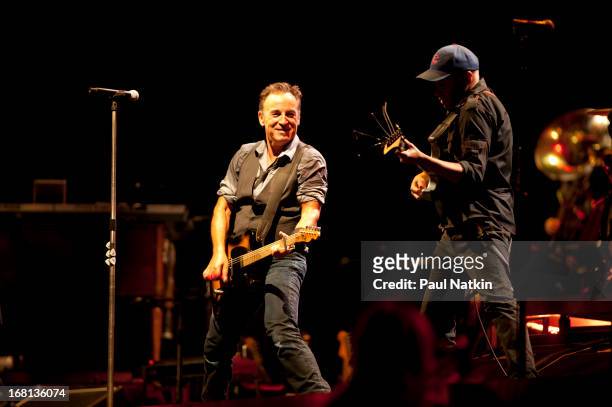American rock musician Bruce Springsteen performs on stage with the E Street Band and special guest Tom Morello during the 'Wrecking Ball' tour at...