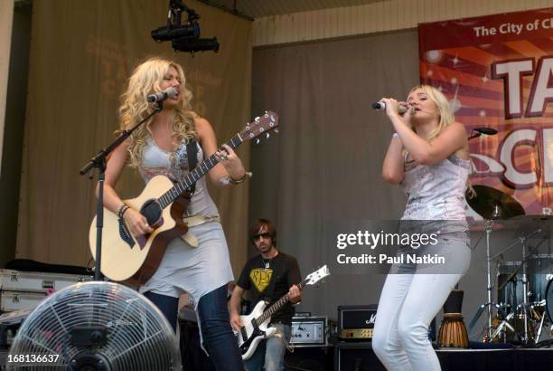 American sibling pop musicians and actresses Alyson and Amanda Michalka, who perform as Aly and AJ , play on the Petrillo Band Shell in Grant Park...