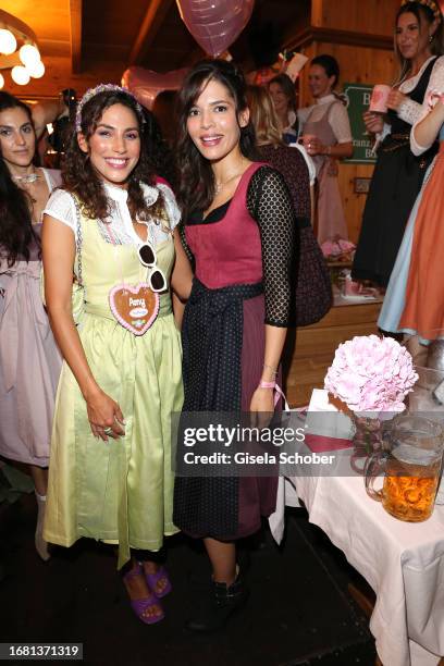 Amy Mußul and Jasmin Gassmann during the Madlwiesn" at the 188th Oktoberfest on September 21, 2023 in Munich, Germany.