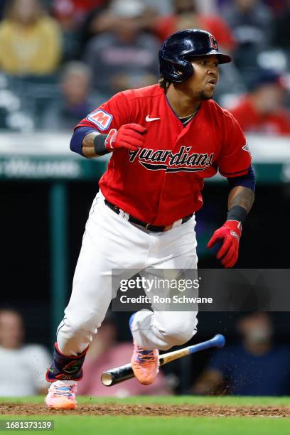 Jose Ramirez of the Cleveland Guardians hits an RBI single off Grayson Rodriguez of the Baltimore Orioles during the fifth inning at Progressive...