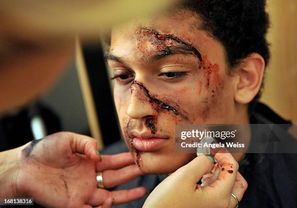 Acting student Samir is getting his make-up done during the Rohde & Schwarz with Hollywood HEART Filmmaking Workshop on May 5, 2013 in Studio City,...