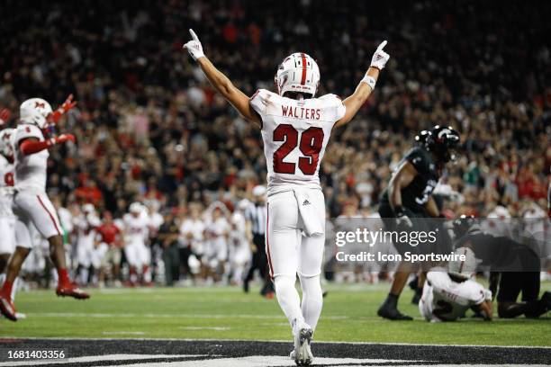 Miami Redhawks defensive back Silas Walters reacts as the Miami Redhawks defeat the Cincinnati Bearcats on September 16 at Nippert Stadium in...