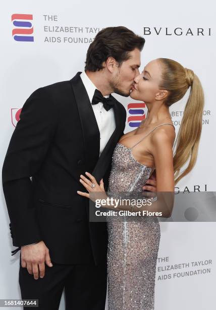 Gleb Savchenko and Elena Belle at the Elizabeth Taylor Ball to End AIDS at The Beverly Hills Hotel on September 21, 2023 in Beverly Hills, California.