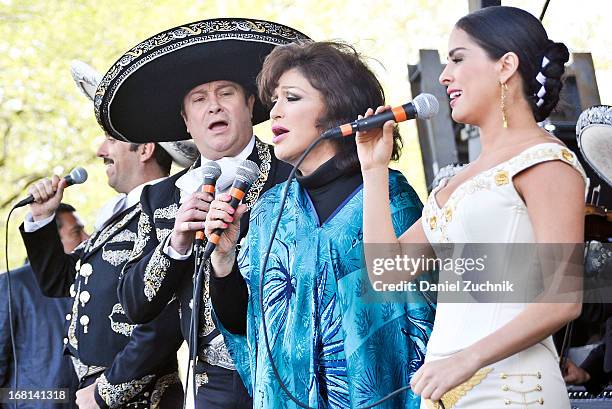 Arturo Peniche, Angelica Maria and Danna Garcia perform during the Que Bonito Amor presentation at the Festival Cinco de Mayo in Flushing Meadows...