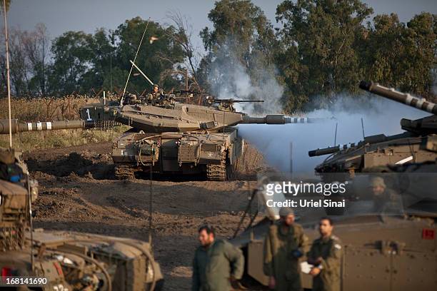 An Israeli Merkava tank during a drill near the border with Syria at the Israeli-annexed Golan Heights on May 6, 2013. Syria has accused Israel of...