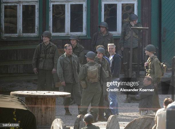 Actor and director George Clooney is seen cheering together with Matt Damon on George Clooney's 51st birthday at the set of the film "The Monuments...