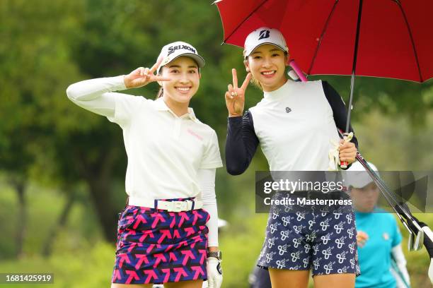 Risa Murata and Rei Matsuda of Japan pose on the 2nd hole during the first round of Sanyo Shimbun Ladies Cup at Tojigaoka Marine Hills Golf Club on...