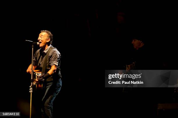 American rock musicians Bruce Springsteen and Steve Van Zandt perform on stage with the E Street Band during the 'Wrecking Ball' tour at Wrigley...