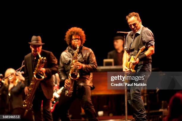 American rock musicians Ed Manion , Jake Clemons , and Bruce Springsteen perform on stage with the E Street Band during the 'Wrecking Ball' tour at...