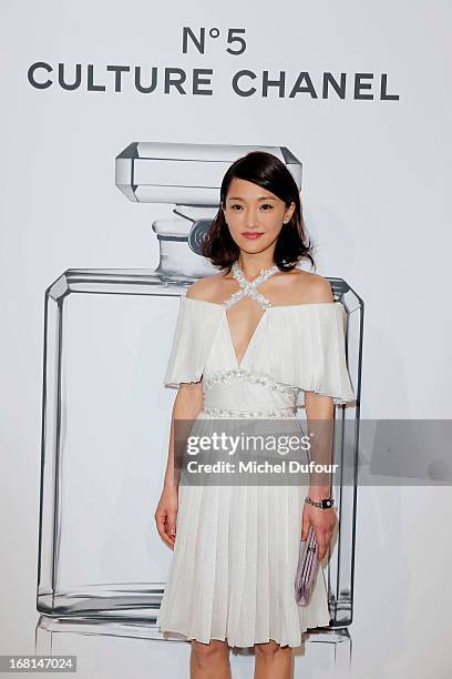 Zhou Xun attends the 'No5 Culture Chanel' Exhibition - Photocall at Palais De Tokyo on May 3, 2013 in Paris, France.