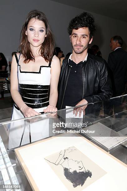 Astrid Berges Frisbey and guest attend the 'No5 Culture Chanel' Exhibition - Photocall at Palais De Tokyo on May 3, 2013 in Paris, France.