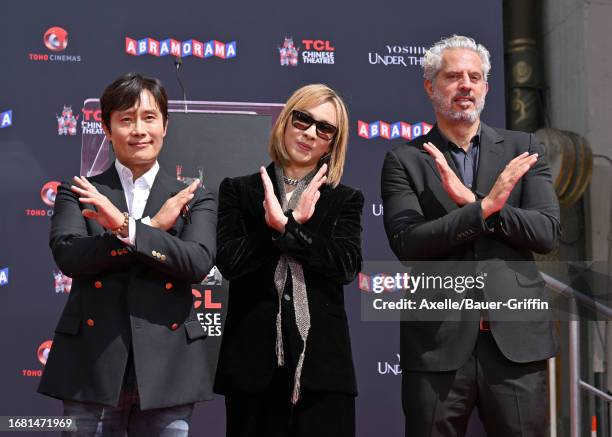 Lee Byung-hun, Yoshiki and Guy Oseary attend the ceremony honoring Yoshiki with a Hand and Footprint Ceremony at TCL Chinese Theatre on September 14,...