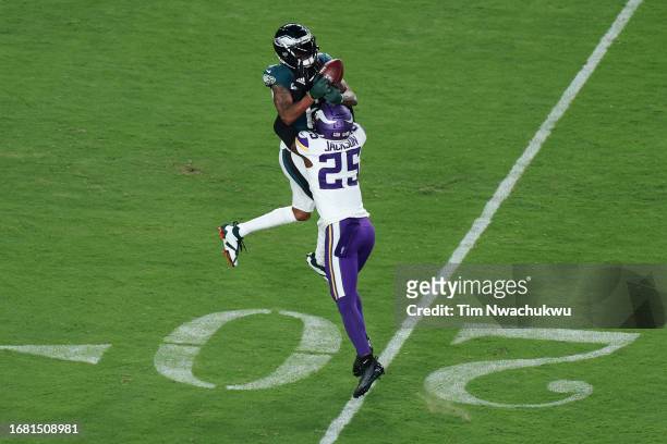 DeVonta Smith of the Philadelphia Eagles catches a pass against Theo Jackson of the Minnesota Vikings during the first quarter at Lincoln Financial...