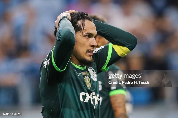 Gustavo Gomez of Palmeiras reacts after missing a chance to score during the match between Gremio and Palmeiras as part of Brasileirao 2023 at Arena...