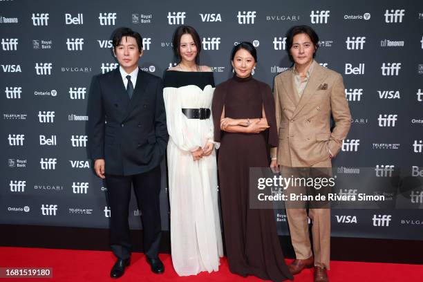 Sol Kyung-gu, Claudia Kim, Kim Hee-ae, and Jang Dong-Gun attend the "A Normal Family" premiere during the 2023 Toronto International Film Festival at...
