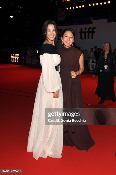 Claudia Kim and Kim Hee-ae and attend the "A Normal Family" premiere during the 2023 Toronto International Film Festival at Roy Thomson Hall on...