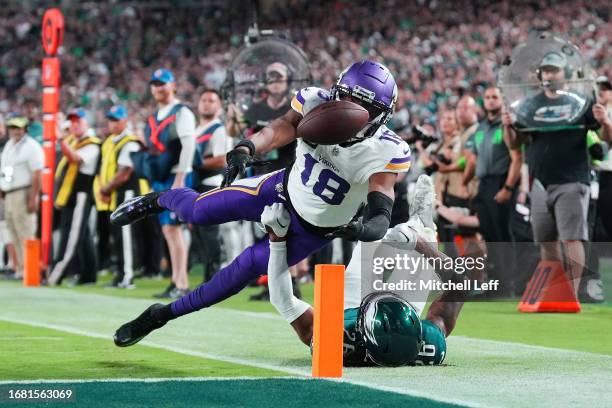 Justin Jefferson of the Minnesota Vikings fumbles the ball over the pylon for a touchback as he is tackled by Terrell Edmunds of the Philadelphia...