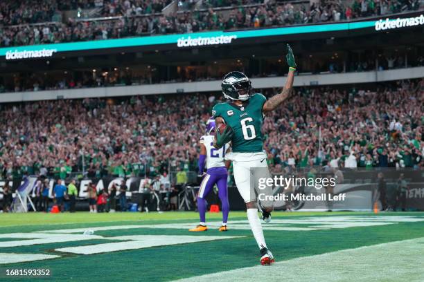 DeVonta Smith of the Philadelphia Eagles celebrates after scoring a 63-yard receiving touchdown during the third quarter against the Minnesota...