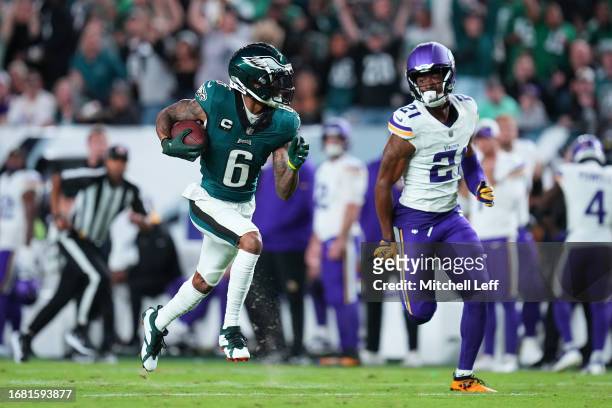 DeVonta Smith of the Philadelphia Eagles runs on his way to scoring a 63-yard receiving touchdown during the third quarter against the Minnesota...