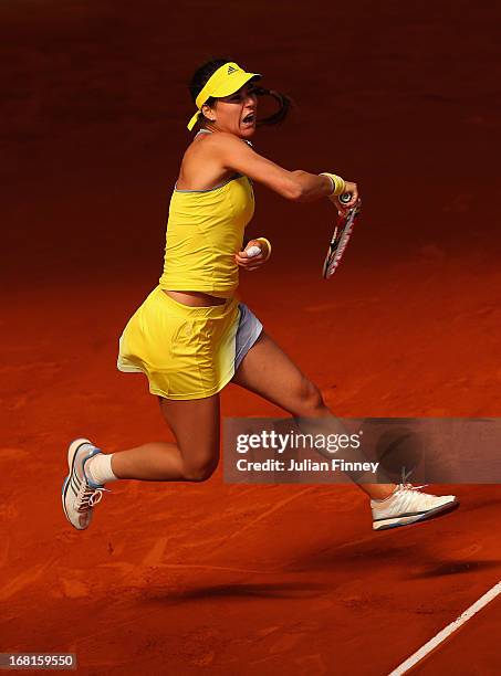 Sorana Cirstea of Romania in action against Sara Errani of Italy during day three of the Mutua Madrid Open tennis tournament at the Caja Magica on...