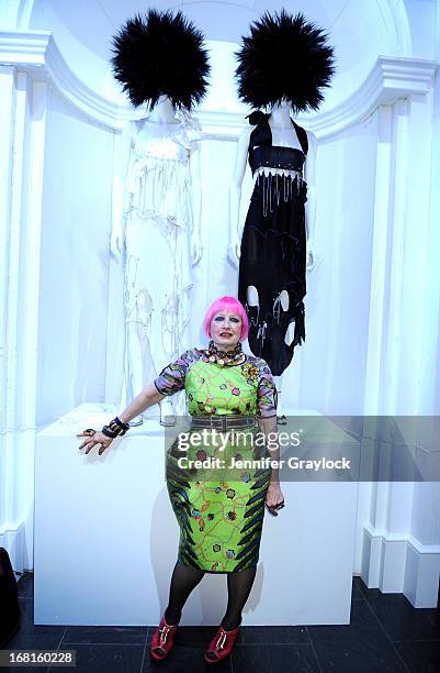 Fashion designer Zandra Rhodes poses infront of her 1970's punk Couture Collection during The "PUNK: Chaos to Couture" Costume Institute Exhibition...