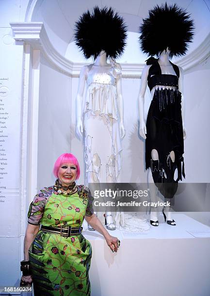 Fashion designer Zandra Rhodes poses infront of her 1970's punk Couture Collection during The "PUNK: Chaos to Couture" Costume Institute Exhibition...
