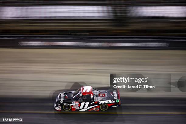Corey Heim, driver of the Safelite Toyota, drives during the NASCAR Craftsman Truck Series UNOH 200 presented by Ohio Logistics at Bristol Motor...