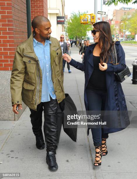 Kim Kardashian and Kanye West are seen in Soho on May 6, 2013 in New York City.