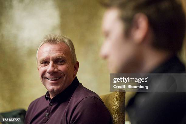 Joseph "Joe" Montana, co-founder of iMFL and retired National Football League quarterback, left, laughs as Damon Grow, co-founder of iMFL, right,...