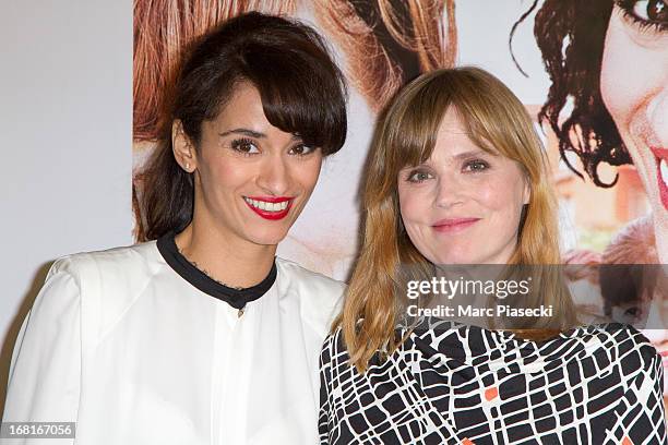 Actresses Rachida Brakni and Isabelle Carre attend the 'Cheba Louisa' Premiere on May 6, 2013 in Paris, France.