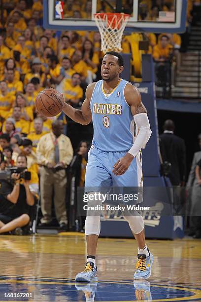 Andre Iguodala of the Denver Nuggets brings the ball up the court against the Golden State Warriors in Game Six of the Western Conference...