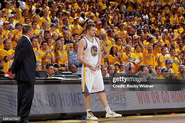 David Lee of the Golden State Warriors prepares to check into the game against the Denver Nuggets in Game Six of the Western Conference Quarterfinals...