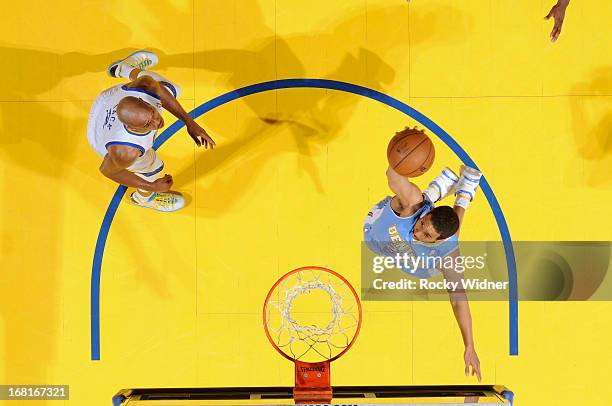 Andre Miller of the Denver Nuggets rebounds against the Golden State Warriors in Game Six of the Western Conference Quarterfinals during the 2013 NBA...