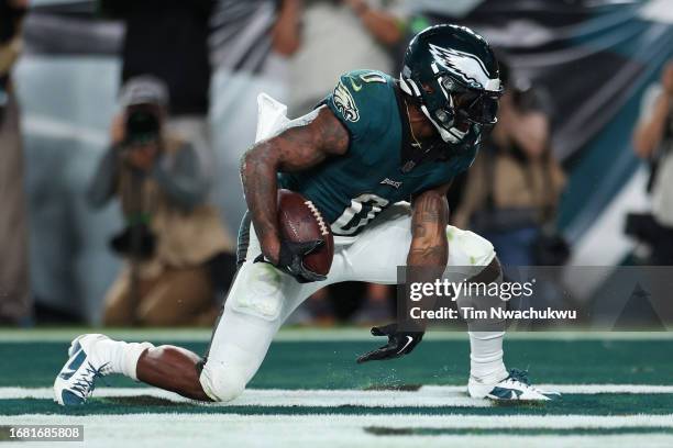 Andre Swift of the Philadelphia Eagles celebrates scoring a touchdown during the fourth quarter against the Minnesota Vikings at Lincoln Financial...