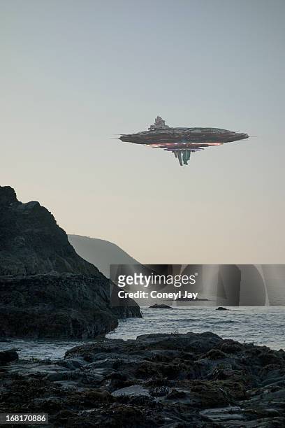 ufo / flying saucer / alien spacecraft - rocky coastline stock pictures, royalty-free photos & images