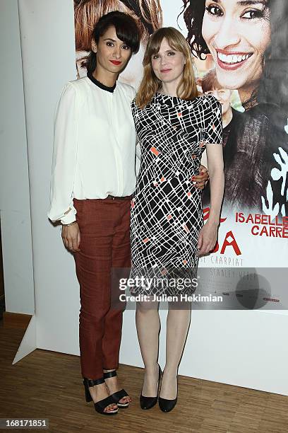 Rachida Brakni and Isabelle Carre attend the 'Cheba Louisa' Paris Premiere at cinema Etoile on May 6, 2013 in Paris, France.