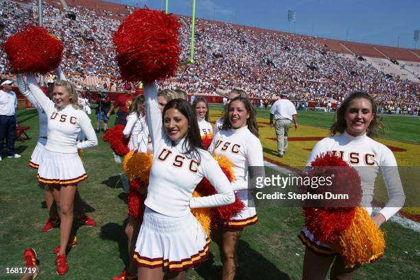 Faryn and the USC Trojans cheerleaders dance on the field during the Pac-10 Conference football game against the Washington Huskies at the Los...