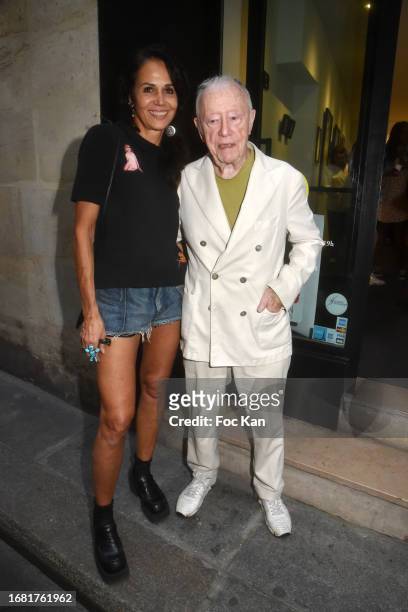 Actress Catherine Wilkening and photographer/designer Maurice Renoma attend "Planches Contact" Maurice Renoma Preview at Galerie on September 14,...