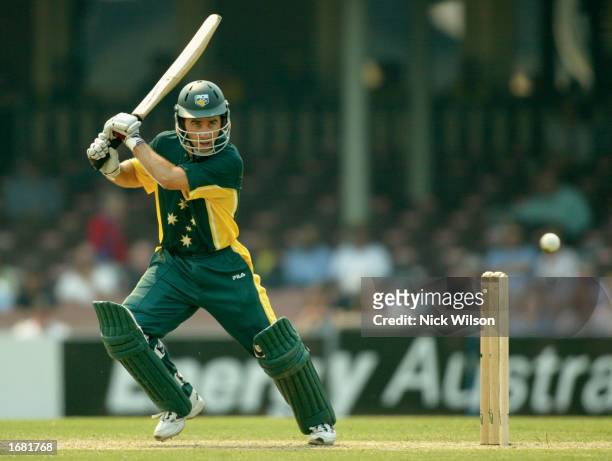 Justin Langer of Australia A hits out during the One Day Tour match between Australia A and England being played at the Sydney Cricket Ground in...