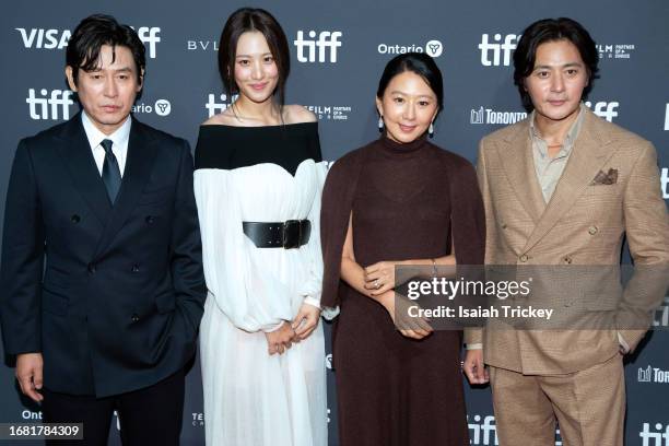 Sul Kyung-gu, Claudia Kim, Kim Hee-ae, and Jang Dong-Gun attend the "A Normal Family" premiere during the 2023 Toronto International Film Festival at...