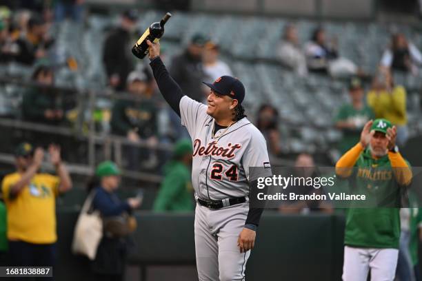 Miguel Cabrera of the Detroit Tigers reacts after receiving a ceremonial gift before the start of a game against the Oakland Athletics at RingCentral...