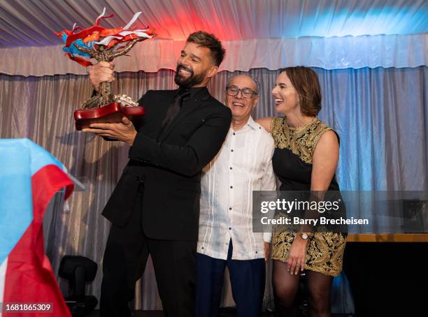 Ricky Martin, Executive Director of the National Museum of Puerto Rican Art and Culture Billy Ocasio and emcee Ana Belaval of WGN-TV during the...