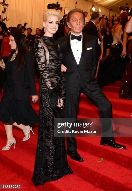 Anne Hathaway and Valentino Garavani attend the Costume Institute Gala for the "PUNK: Chaos to Couture" exhibition at the Metropolitan Museum of Art...